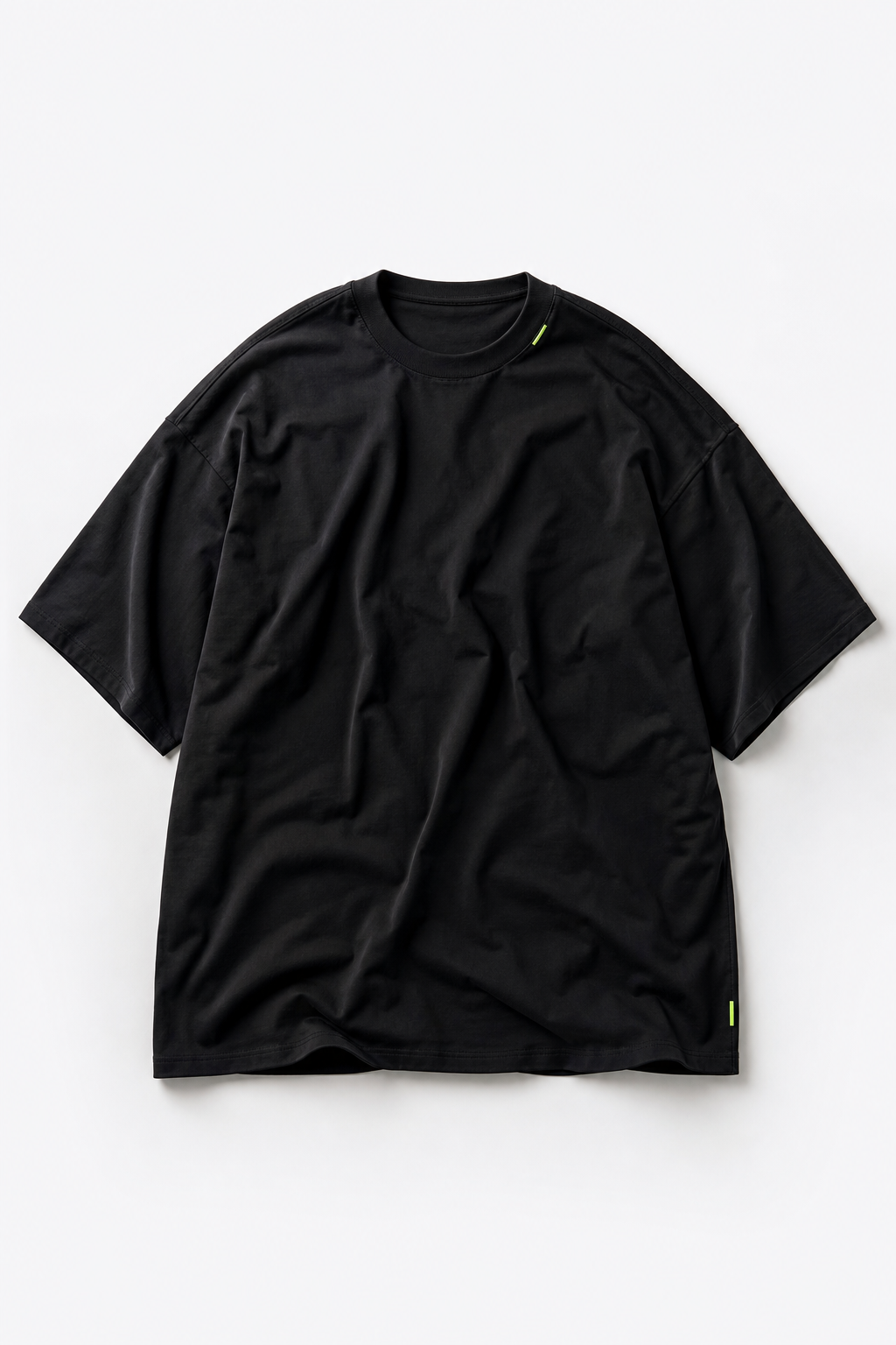 Side profile view showing drop-shoulder fit and sleeve print on custom oversized t-shirt