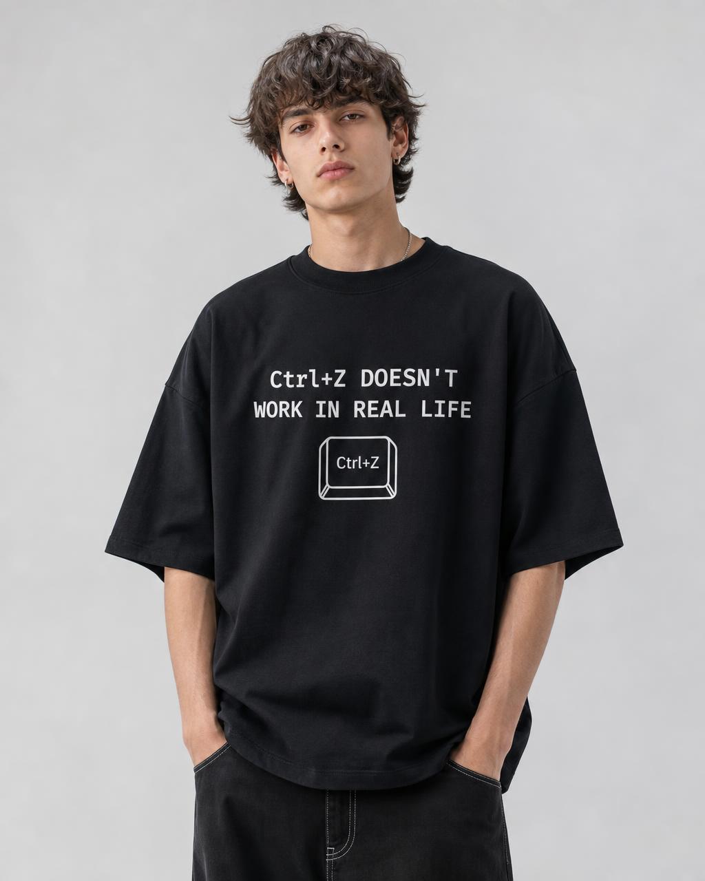 Model wearing Ctrl+Z Doesn't Work In Real Life oversized t-shirt — TASHVII
