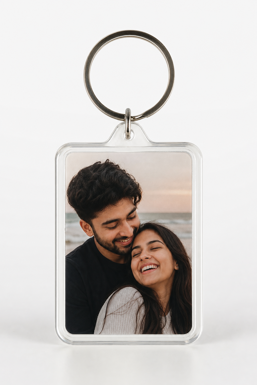 Custom acrylic keychain studio hero shot with vibrant photo print on clear gloss surface