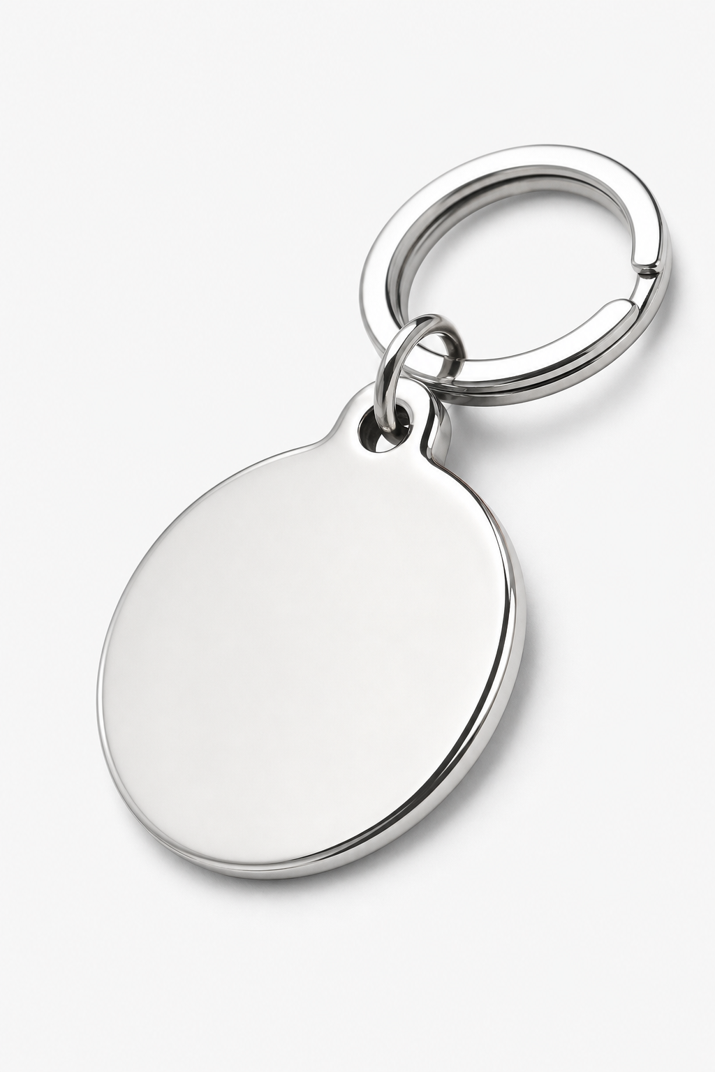Alternate angle of polished metallic pet tag showcasing smooth edges and attachment ring